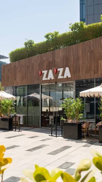 Za Za DIFC interior with oxblood booths and walnut panelling